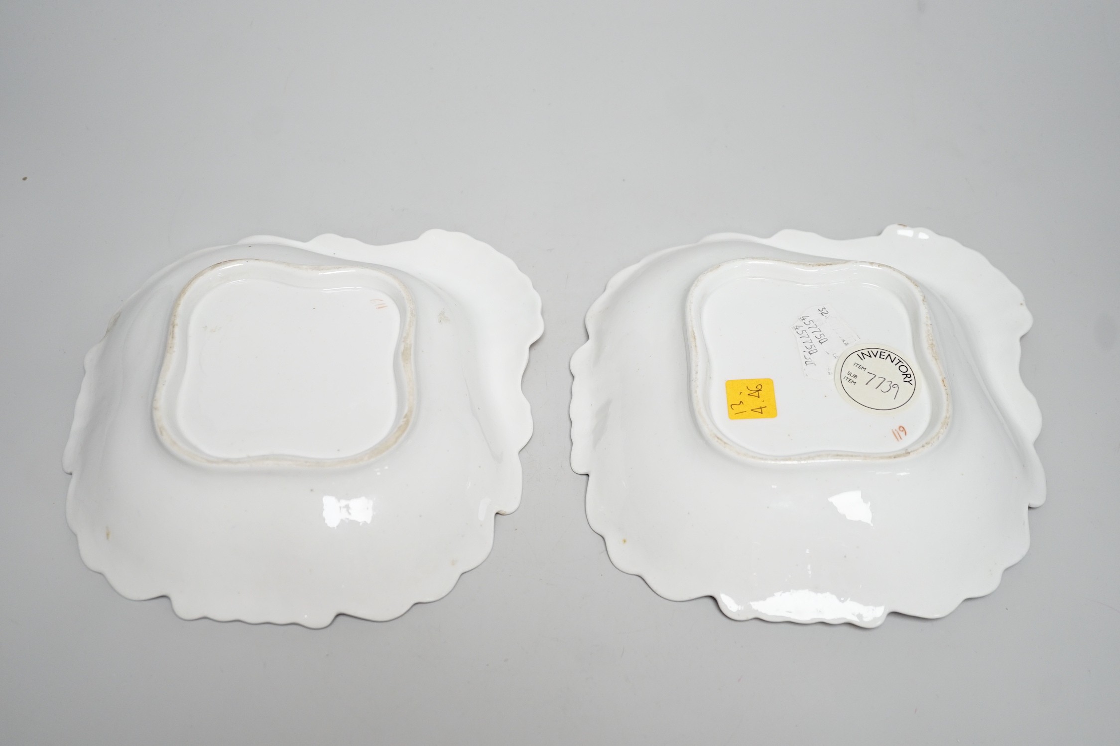 A pair of English porcelain shell shaped dessert dishes, c.1820-25, with floral decoration